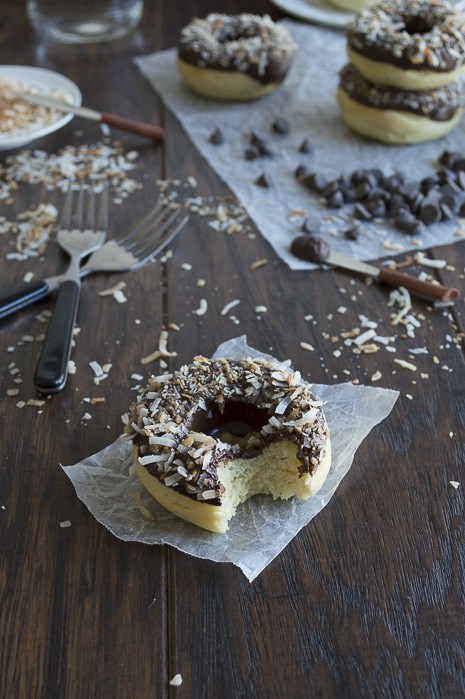 A coconut infused donut glazed with an easy to make chocolate ganache and topped with oven toasted coconut, takes only 10 minutes to bake!