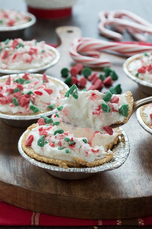 No bake mini white chocolate mousse pies are terrific for Christmas! Top them with red and green holiday chocolate chips! 