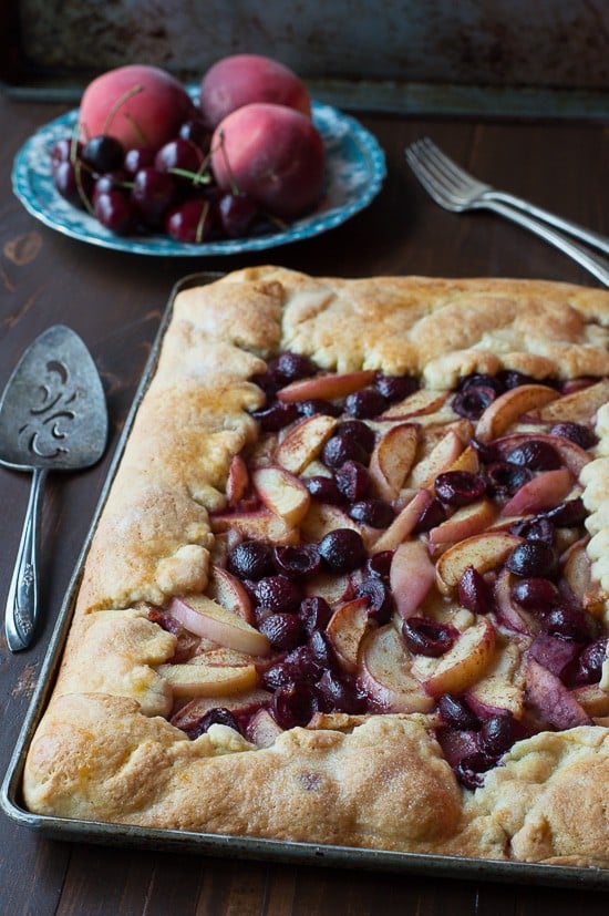 Cherry Peach Slab Pie - an easy open face pie made on a baking sheet! The crust is amazing! 
