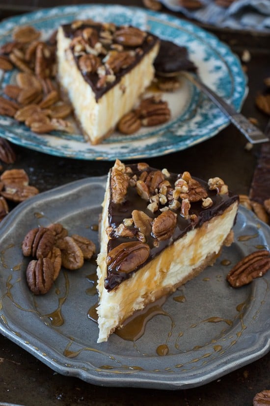 This is the best turtle cheesecake! It’s rich and so creamy. Topped with chocolate ganache, pecans and caramel sauce. 