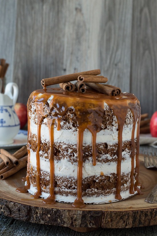 This apple spice cake with caramel drizzle is the best naked cake for fall! With applesauce in the batter, it’s moist and delicious! 