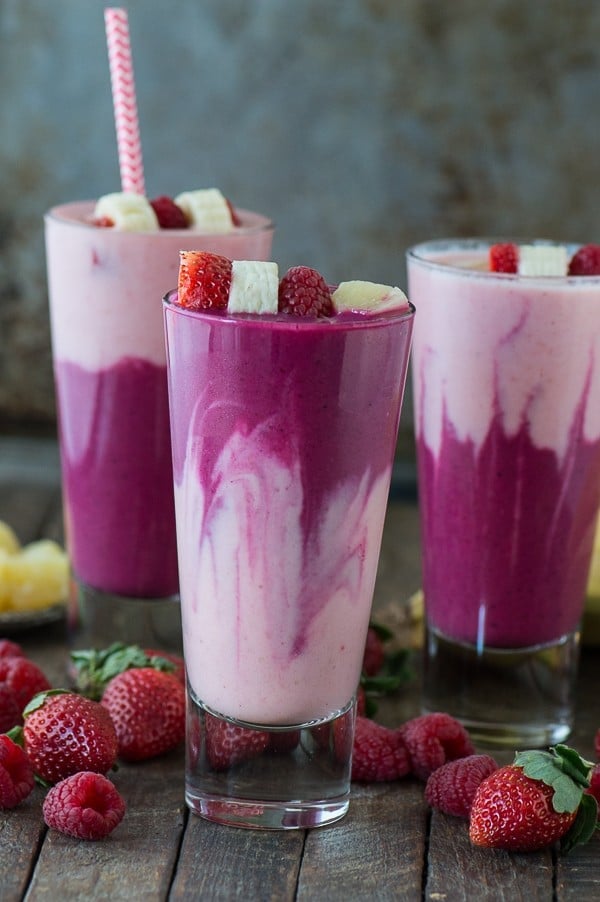 This two layer berry beet smoothie recipe is easy to make, full of fruit, and has a fun color! 