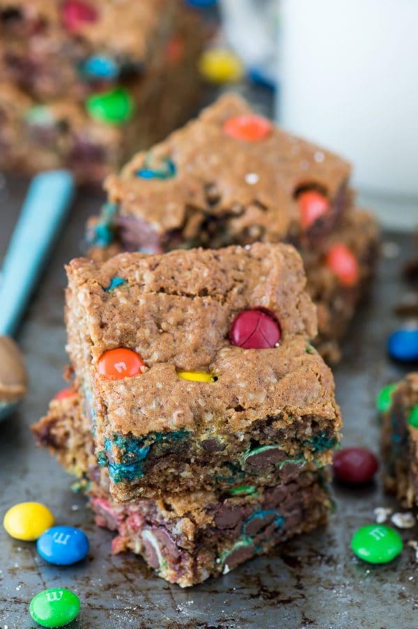 The BEST healthier monster cookie bars with no oil, butter, flour or sugar! Use coconut sugar or honey instead! Makes an 8x8 square pan so you don’t have too many around! 