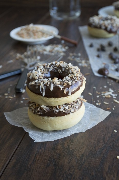 A coconut infused donut glazed with an easy to make chocolate ganache and topped with oven toasted coconut, takes only 10 minutes to bake! 