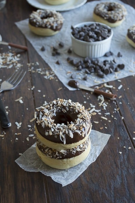 A coconut infused donut glazed with an easy to make chocolate ganache and topped with oven toasted coconut, takes only 10 minutes to bake!