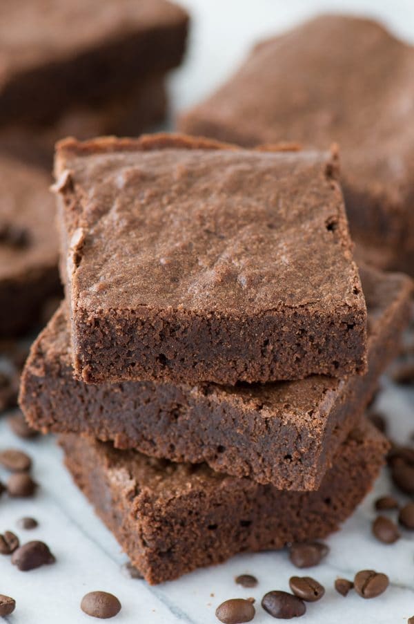 The best espresso brownies with real espresso grounds! Fudgy and dense, adaptable recipe for a small or large pan!