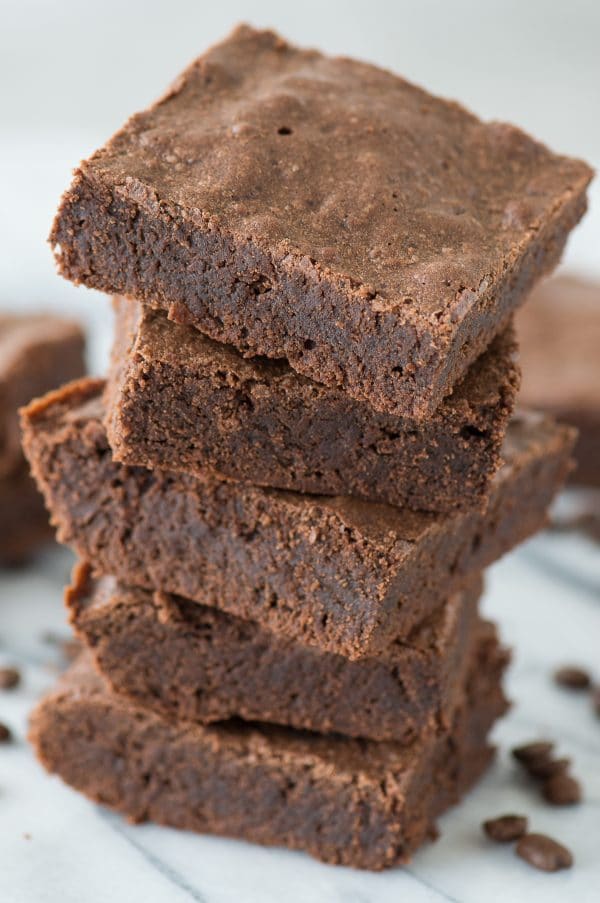 The best espresso brownies with real espresso grounds! Fudgy and dense, adaptable recipe for a small or large pan!