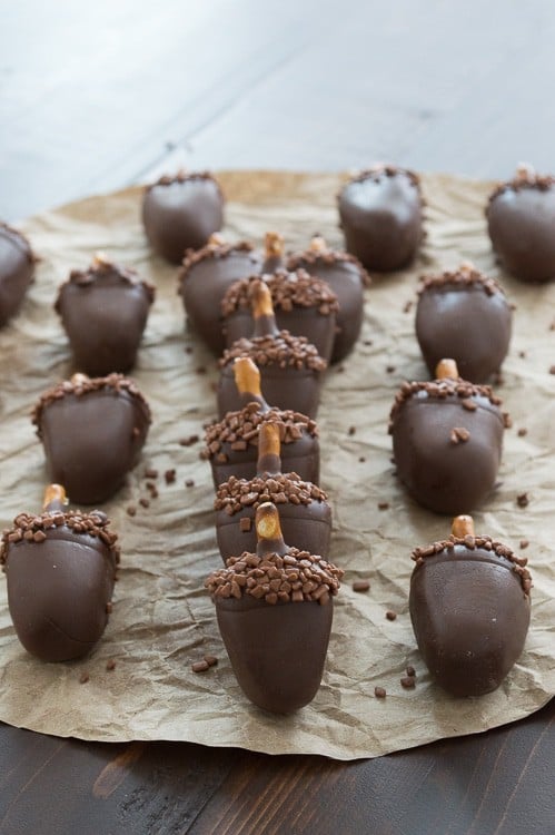 Sixteen Peanut butter oreo ball desserts on parchment paper