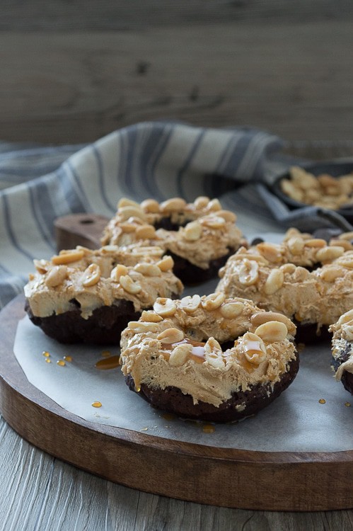 A rich, chocolate donut with marshmallow peanut butter nougat topped with peanuts and caramel sauce. You need to make these, they are AMAZING!