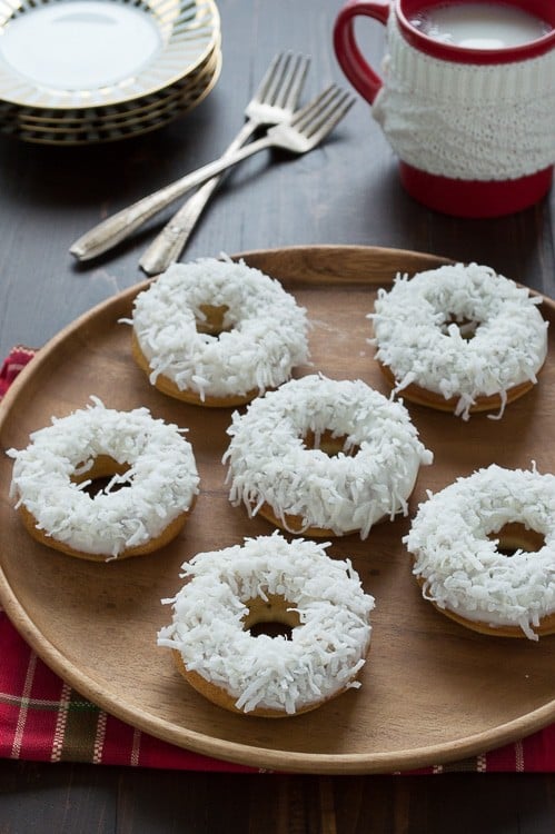 Baked caramel coconut donuts all dressed up to look like snowmen! These are SO adorable and easy to put together!!