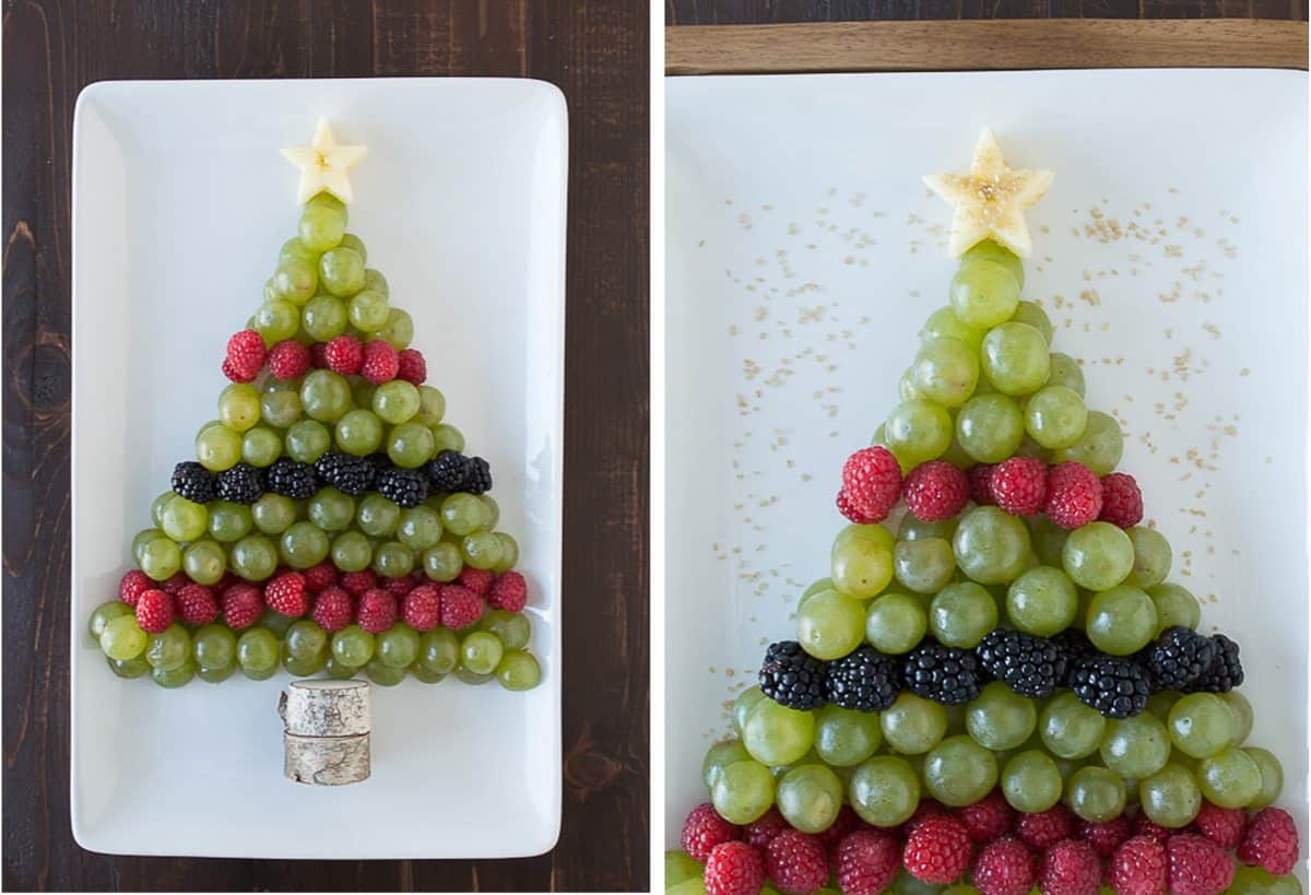 green grapes, raspberries and blackberries arranged to look like a Christmas tree on white platter