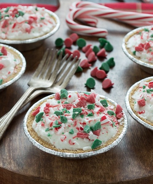 No bake mini white chocolate mousse pies are terrific for Christmas! Top them with red and green holiday chocolate chips!