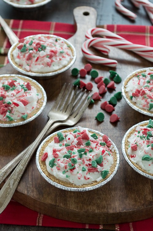 No bake mini white chocolate mousse pies are terrific for Christmas! Top them with red and green holiday chocolate chips! 