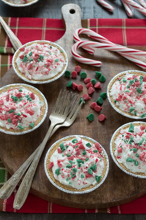 No bake mini white chocolate mousse pies are terrific for Christmas! Top them with red and green holiday chocolate chips! 