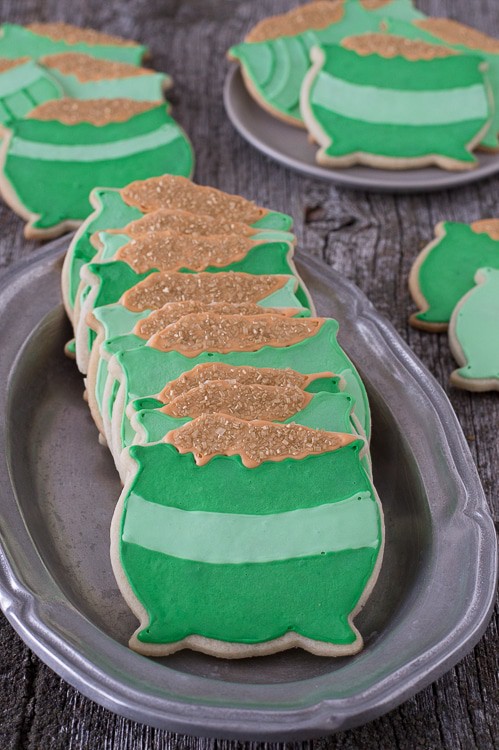 Nine St. Patrick's Day Cookies on a silver platter.