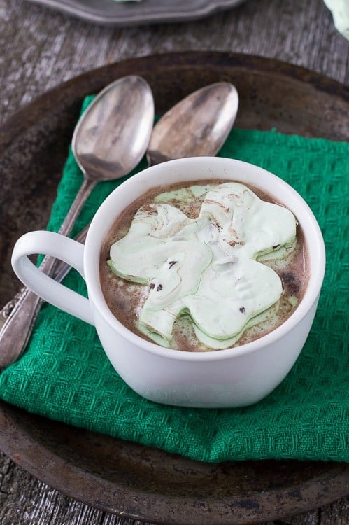 Mint Chocolate Chip Shamrock Marshmallows in a mug of hot cocoa.