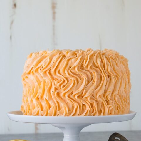 Orange Poppyseed Cake - three layer orange poppyseed cake with a fresh orange buttercream!