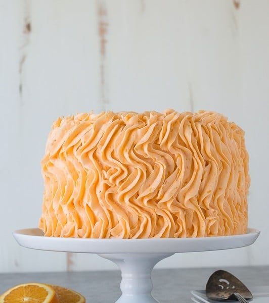 Orange Poppyseed Cake - three layer orange poppyseed cake with a fresh orange buttercream!