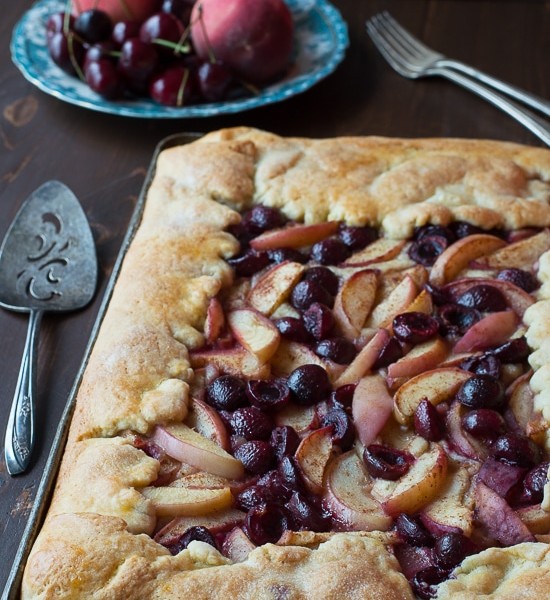 Cherry Peach Slab Pie - an easy open face pie made on a baking sheet! The crust is amazing!