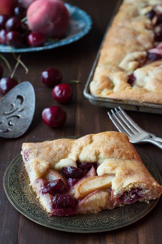 Cherry Peach Slab Pie - an easy open face pie made on a baking sheet! The crust is amazing! 