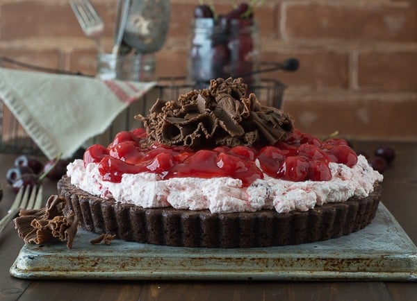 Cherry Brownie Tart - a brownie tart topped with cherry filling and chocolate curls!