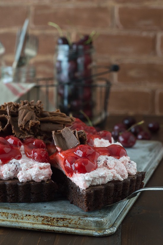 Cherry Brownie Tart - a brownie tart topped with cherry filling and chocolate curls!