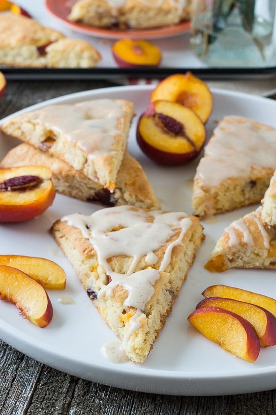 These fruit scones are loaded with fresh nectarines then drizzled with a vanilla bean glaze! Only 30 minutes from start to finish! 