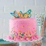 This pink confetti chocolate chip cake is so fun and and colorful. There are mini chocolate chips inside the cake!