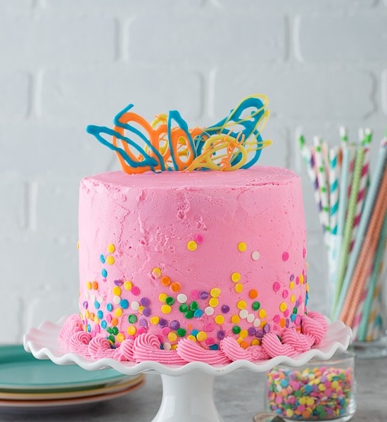 This pink confetti chocolate chip cake is so fun and and colorful. There are mini chocolate chips inside the cake!