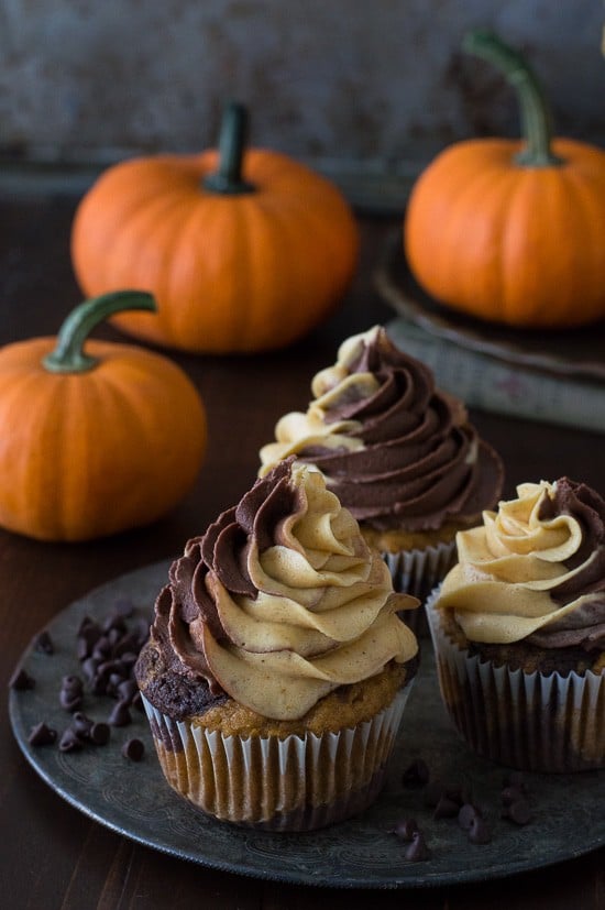 The BEST pumpkin chocolate cupcakes! With swirled cake and swirled pumpkin chocolate buttercream! 