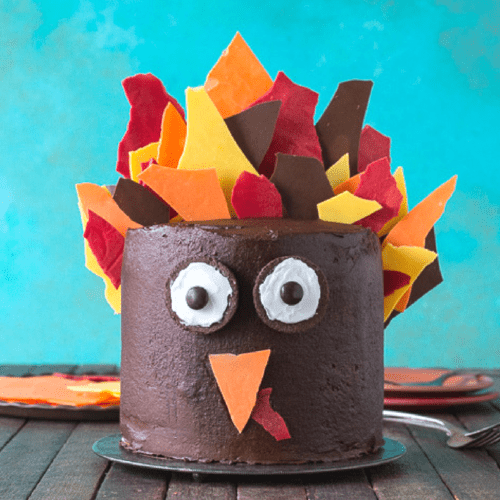 Turkey cake made using Wiltons Sweet Baby Duck cake pan. Tail feathers are  made by spreading melted Wilton's Candy Mel…