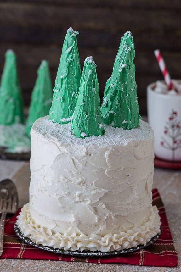 Easy gingerbread cake with vanilla bean buttercream, topped with snowy christmas trees! 