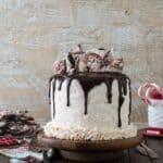 Peppermint chocolate cake recipe! Complete with chocolate cake, peppermint buttercream, chocolate ganache, and a peppermint bark topping!