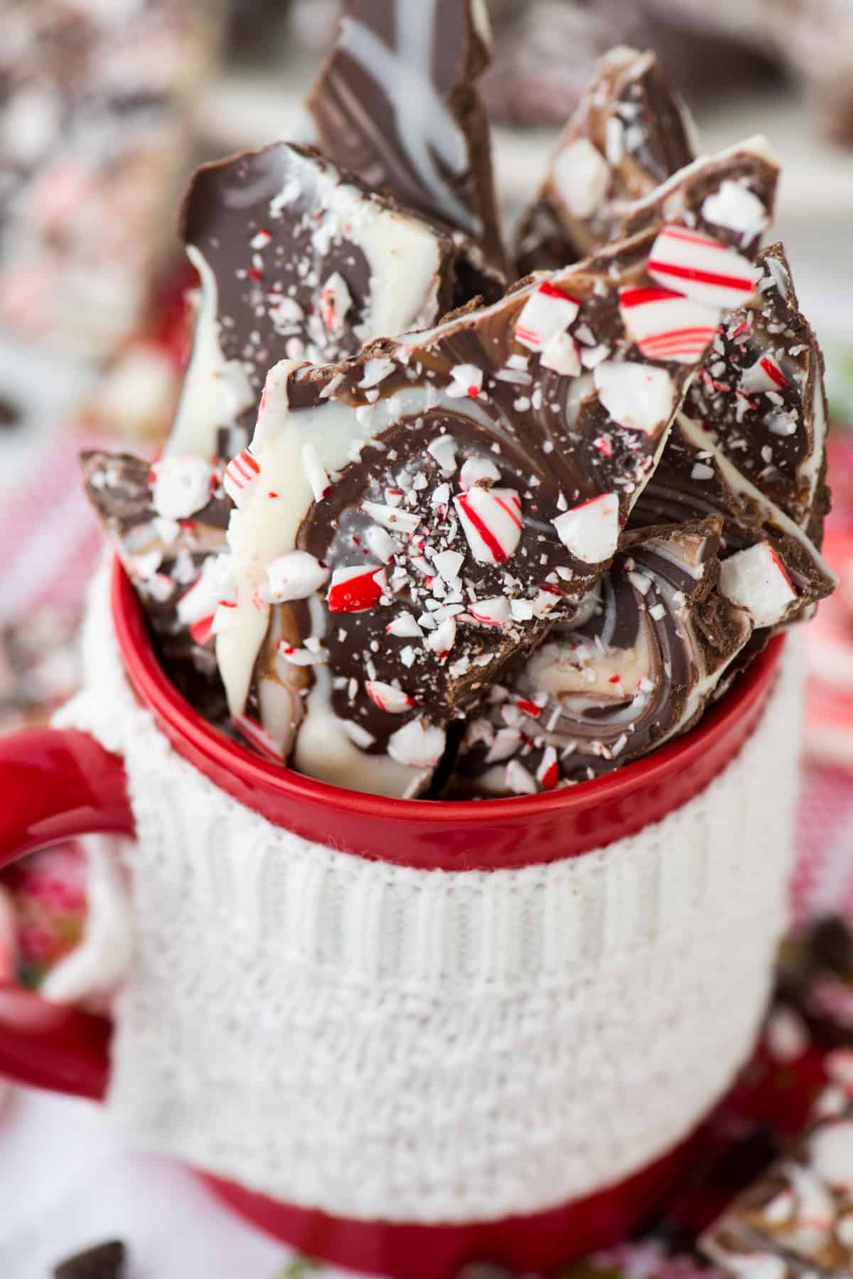swirled chocolate and white chocolate peppermint bark in red mug