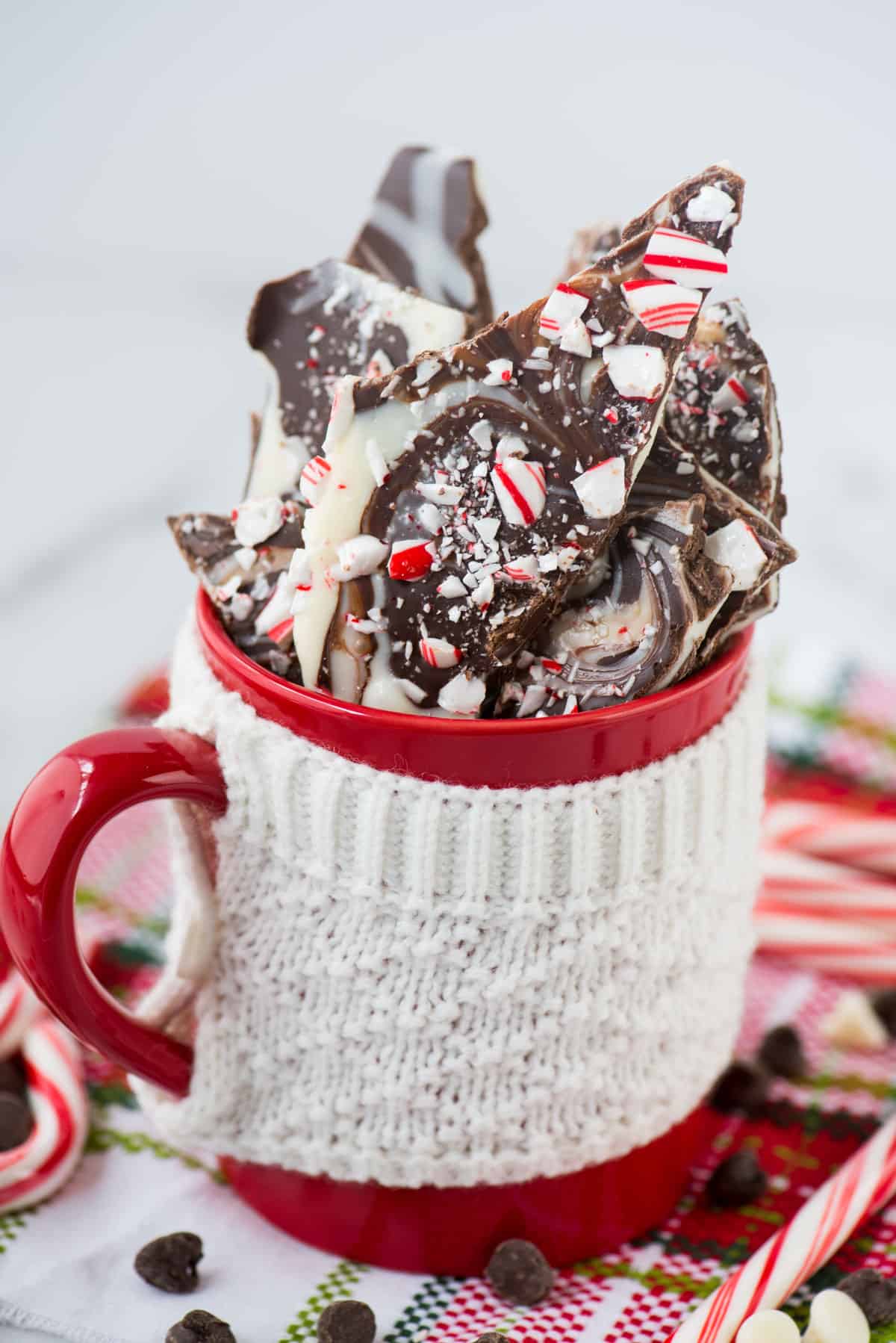 swirled chocolate and white chocolate peppermint bark in red mug