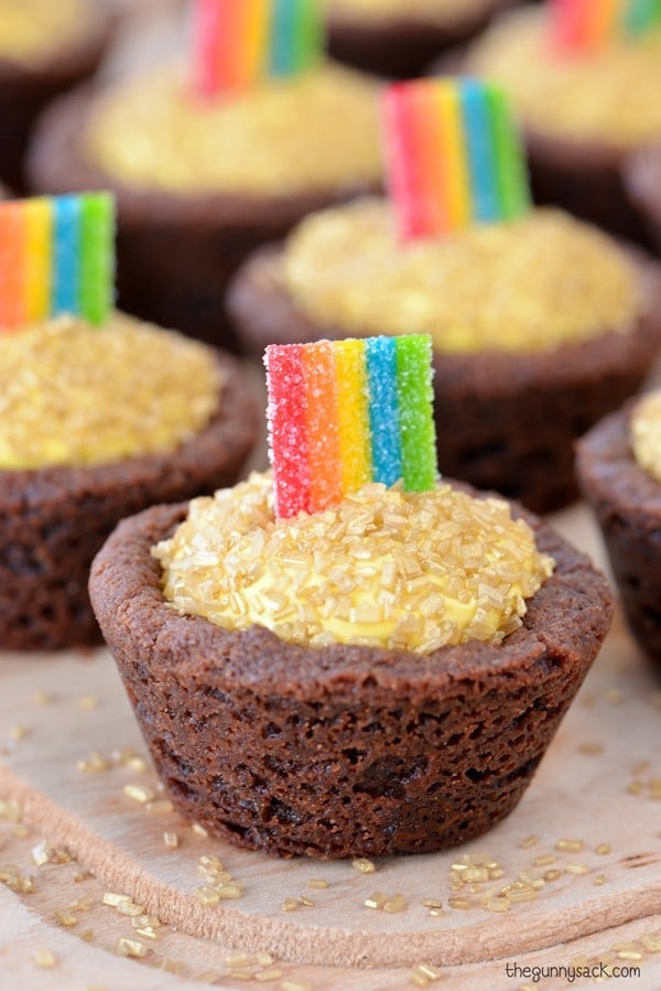 Pot of Gold Cookie Cups on a wooden board.