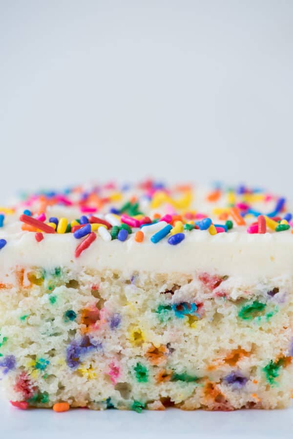 close up image of a slice of funfetti cake