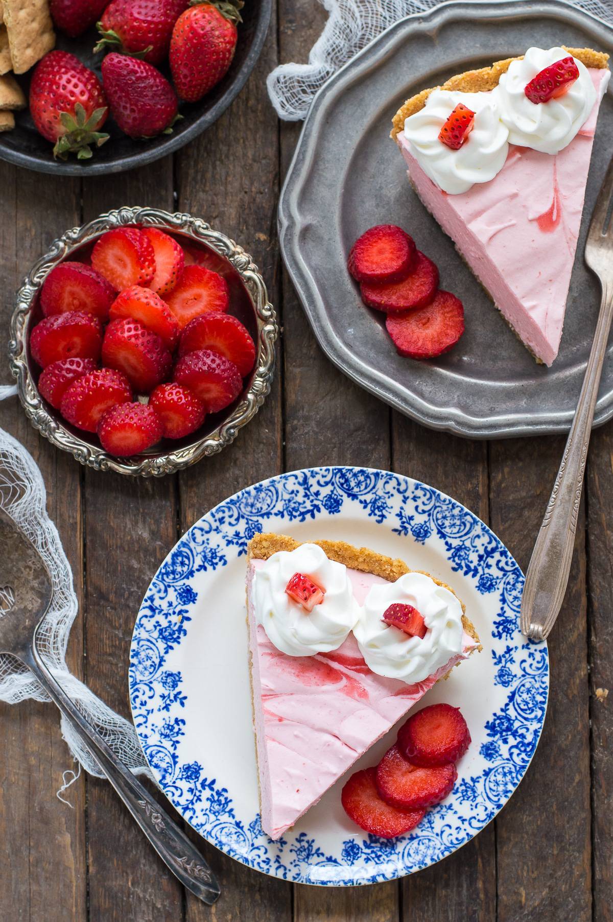 Fresh strawberry mousse pie with real strawberry puree and a homemade graham cracker crust!