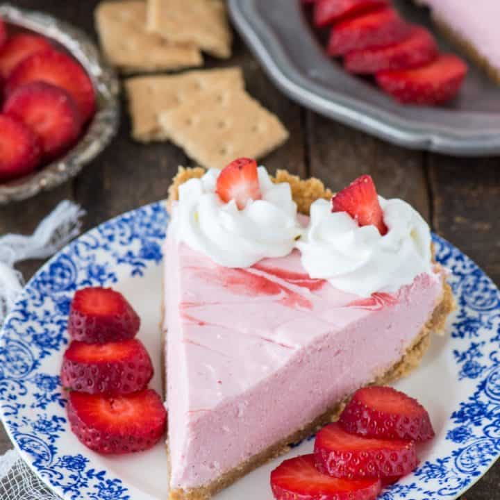 Fresh strawberry mousse pie with real strawberry puree and a homemade graham cracker crust!
