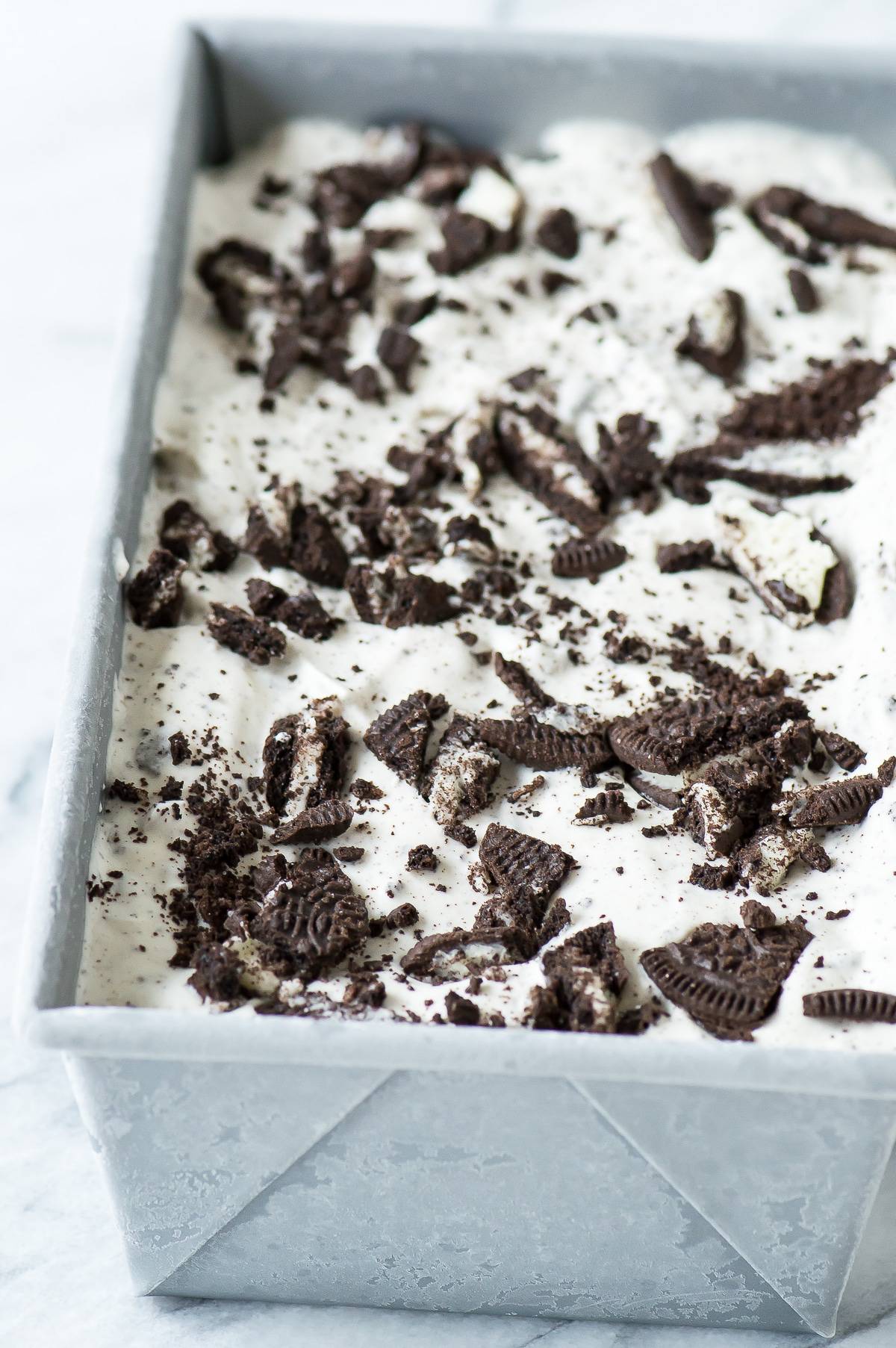 Homemade Oreo Ice Cream in a metal loaf pan