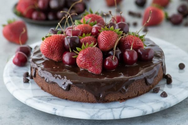 Classic chocolate mud cake recipe with chocolate ganache. Top with fresh berries during the summer. 