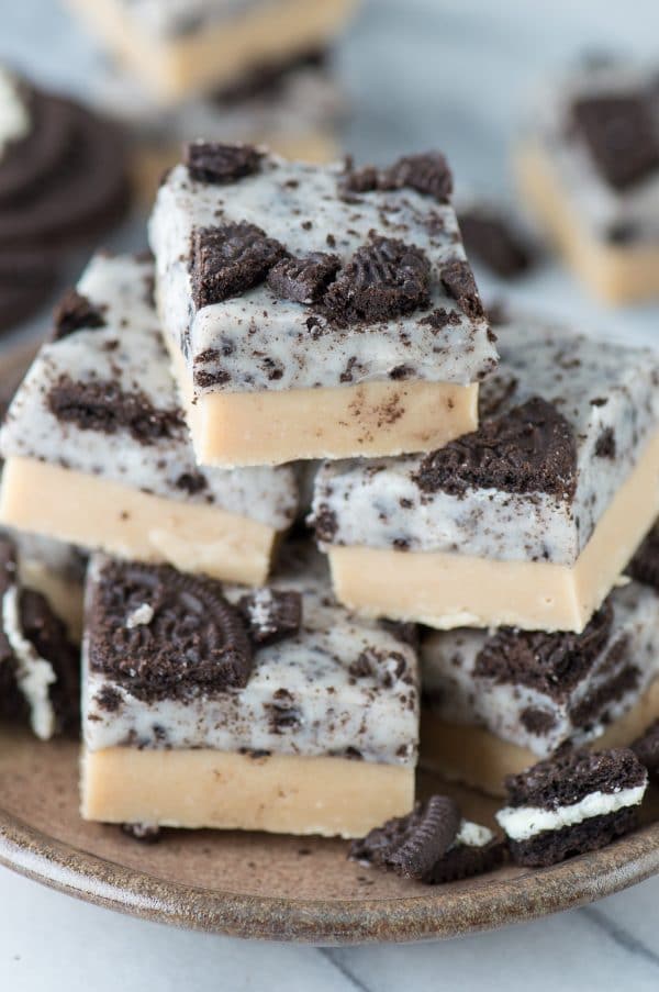 Two layer peanut butter oreo fudge recipe that is only 4 ingredients! This is easiest and BEST fudge recipe! 