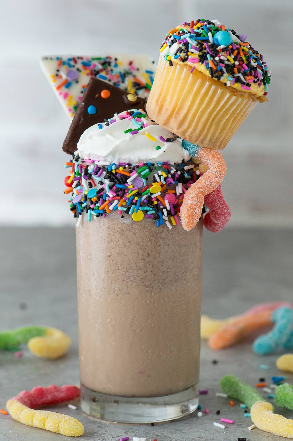 Look at this over the top, crazy funfetti brownie mocha milkshake! I can’t decide if my favorite part is the cupcake or the gummy worms!