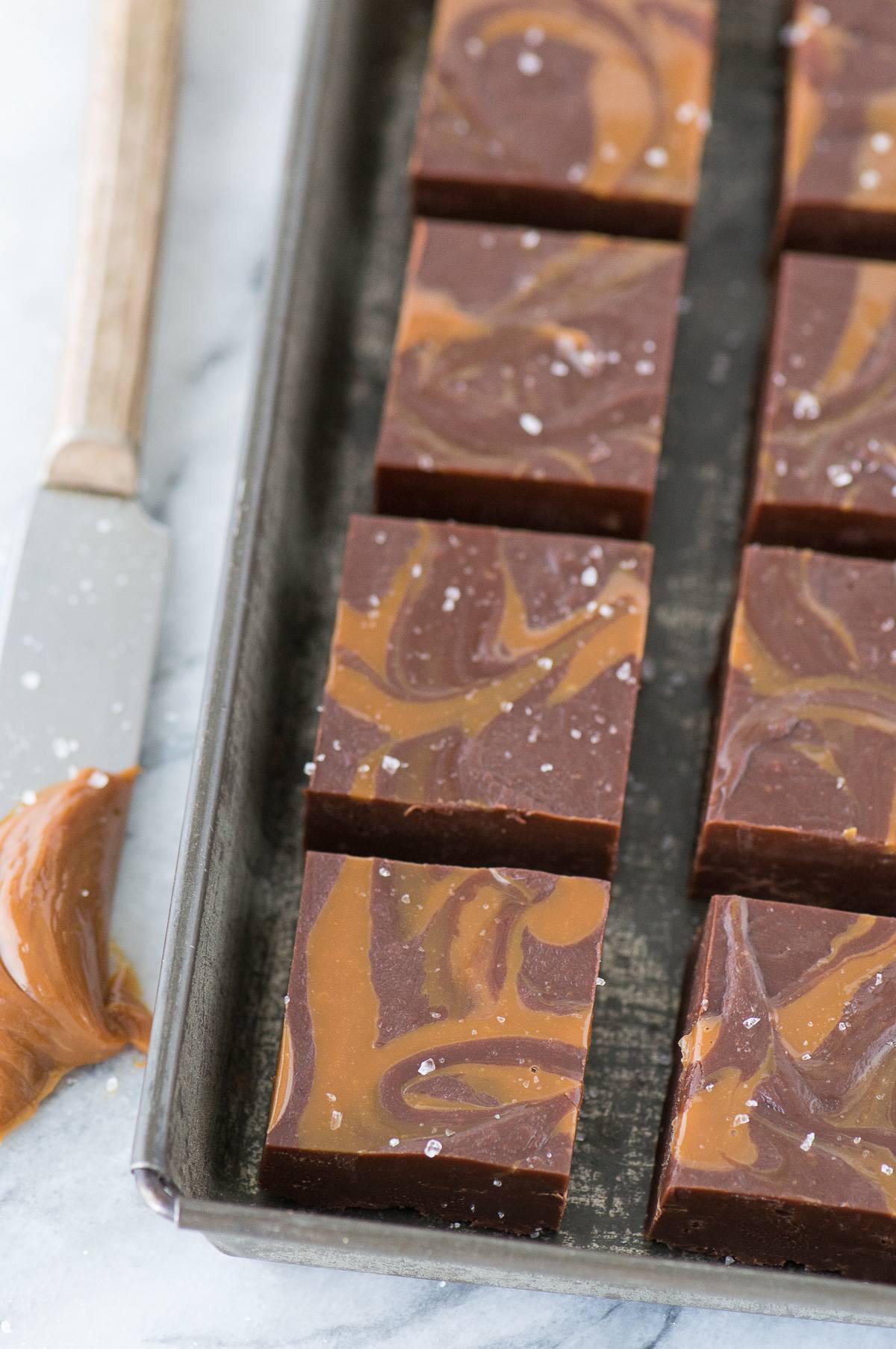 The BEST salted caramel mocha fudge with dulce de leche swirls and sprinkled the sea salt! 7 ingredients and ready to eat in 3 hours! 