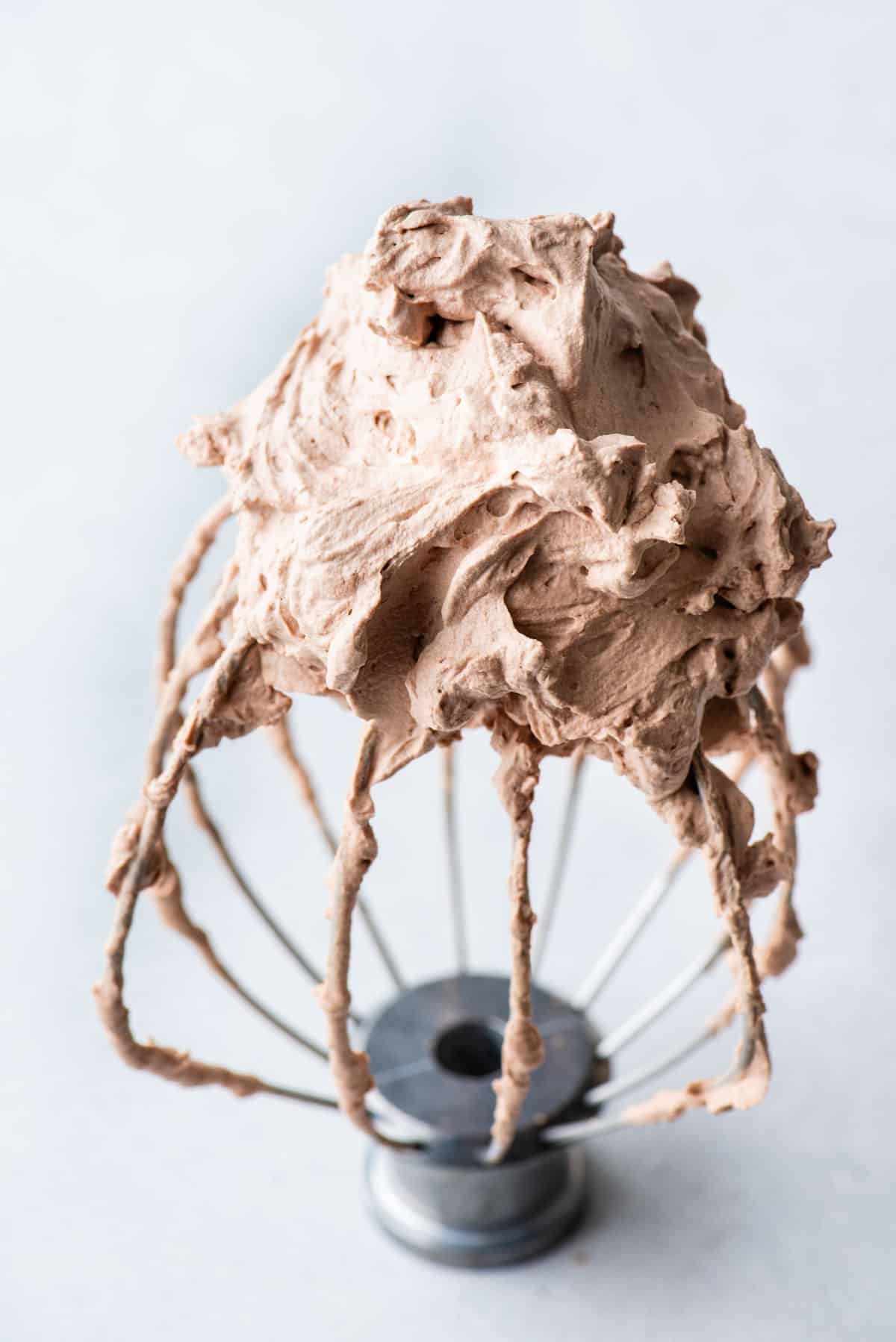 chocolate whipped cream on wire beater