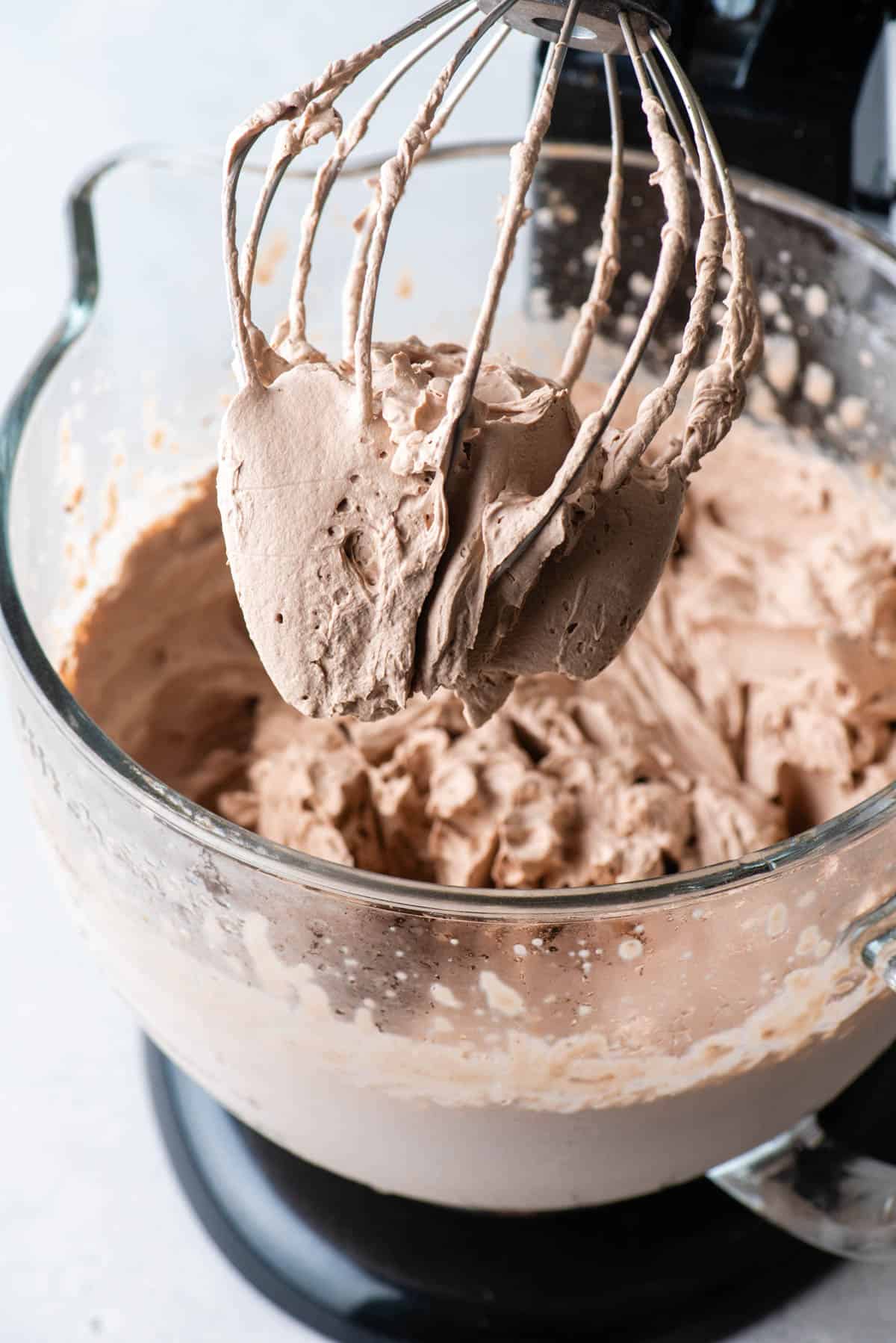 stand mixer showing chocolate whipped cream