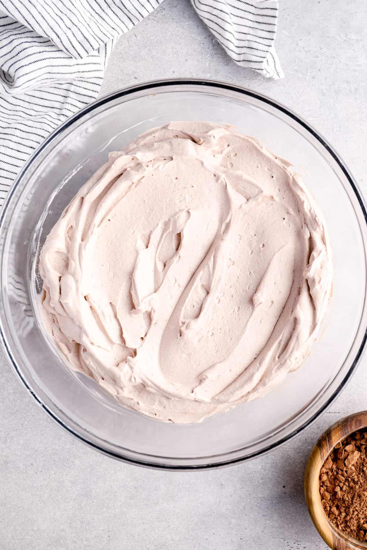 chocolate whipped cream in large glass mixing bowl