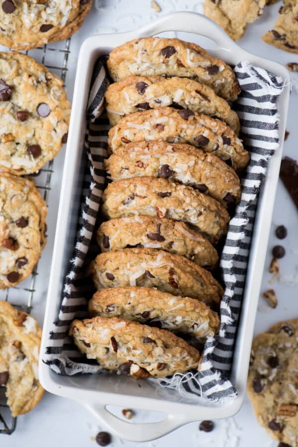 cowboy cookies lined up in white loaf pan