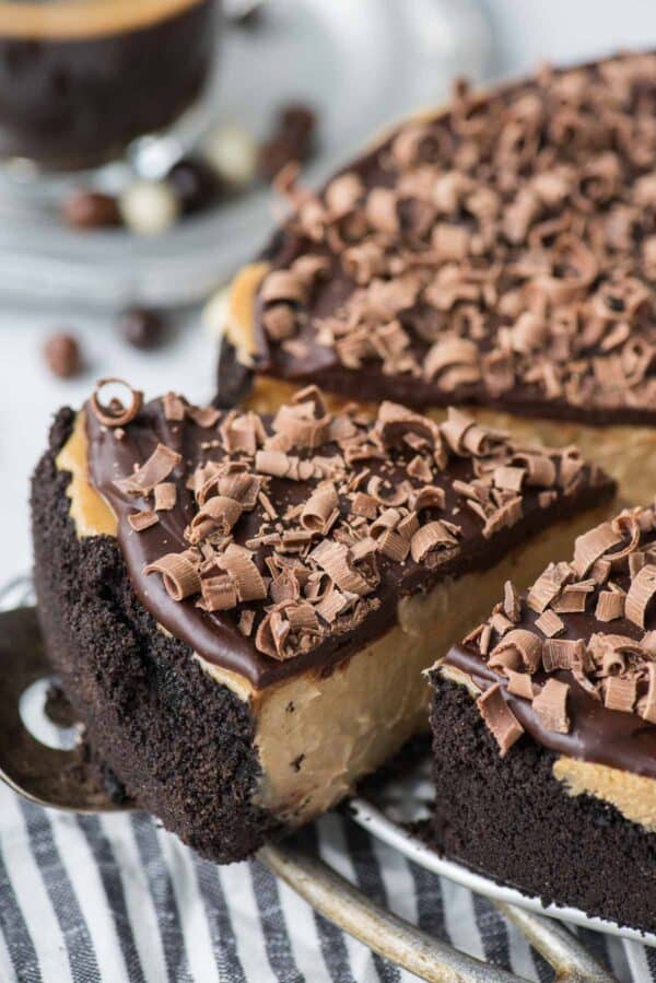 slice of coffee cheesecake on metal serving spatula