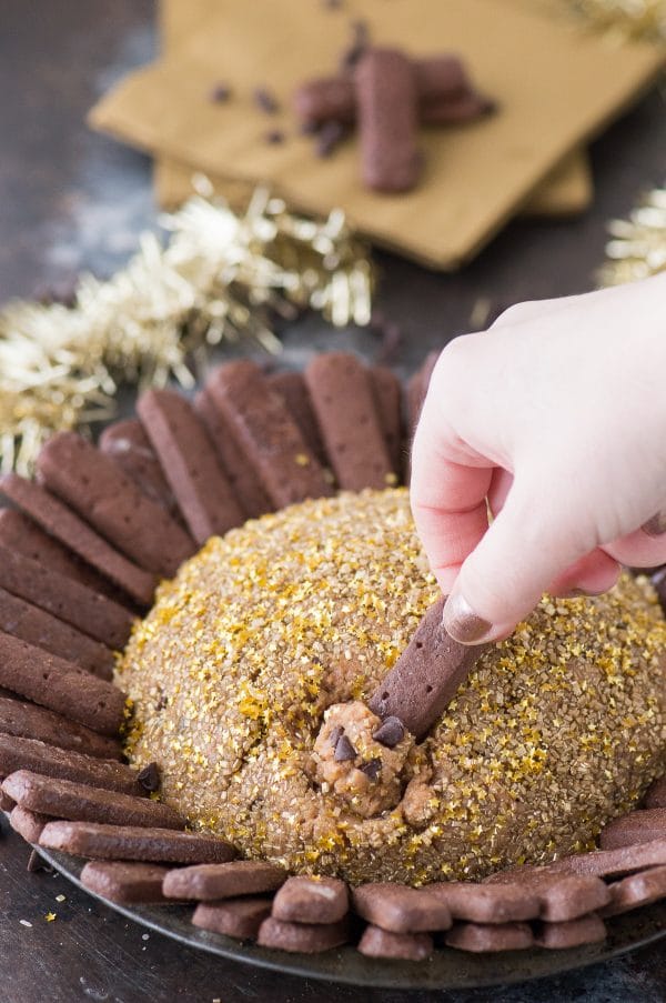 A fun New Year’s Eve peanut butter chocolate chip cheesecake ball! This is a kid friendly New Year’s Eve recipe! 